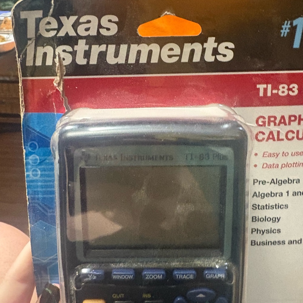 Texas Instruments TI-83 Plus Red and Black Calculator - Picture 4 of 5